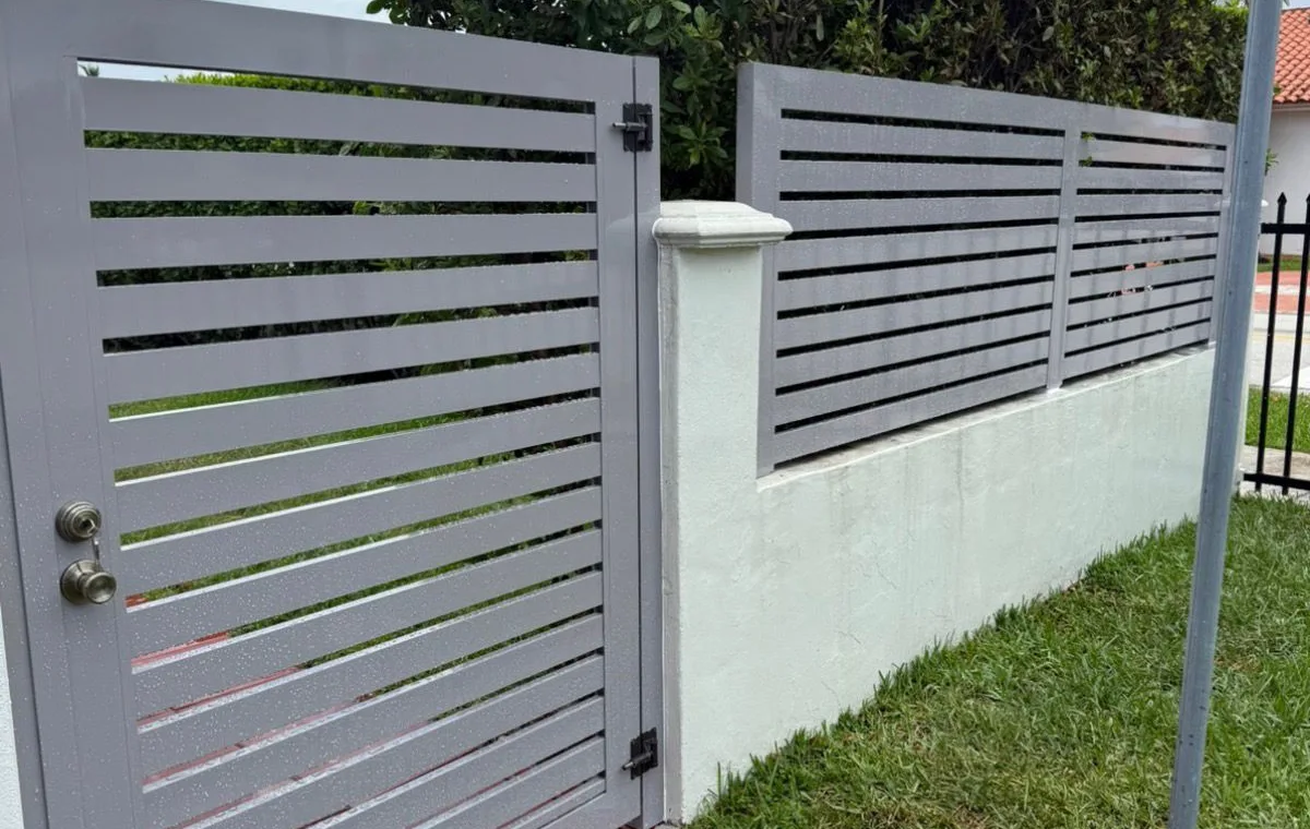 Slat gate and fence before refinishing